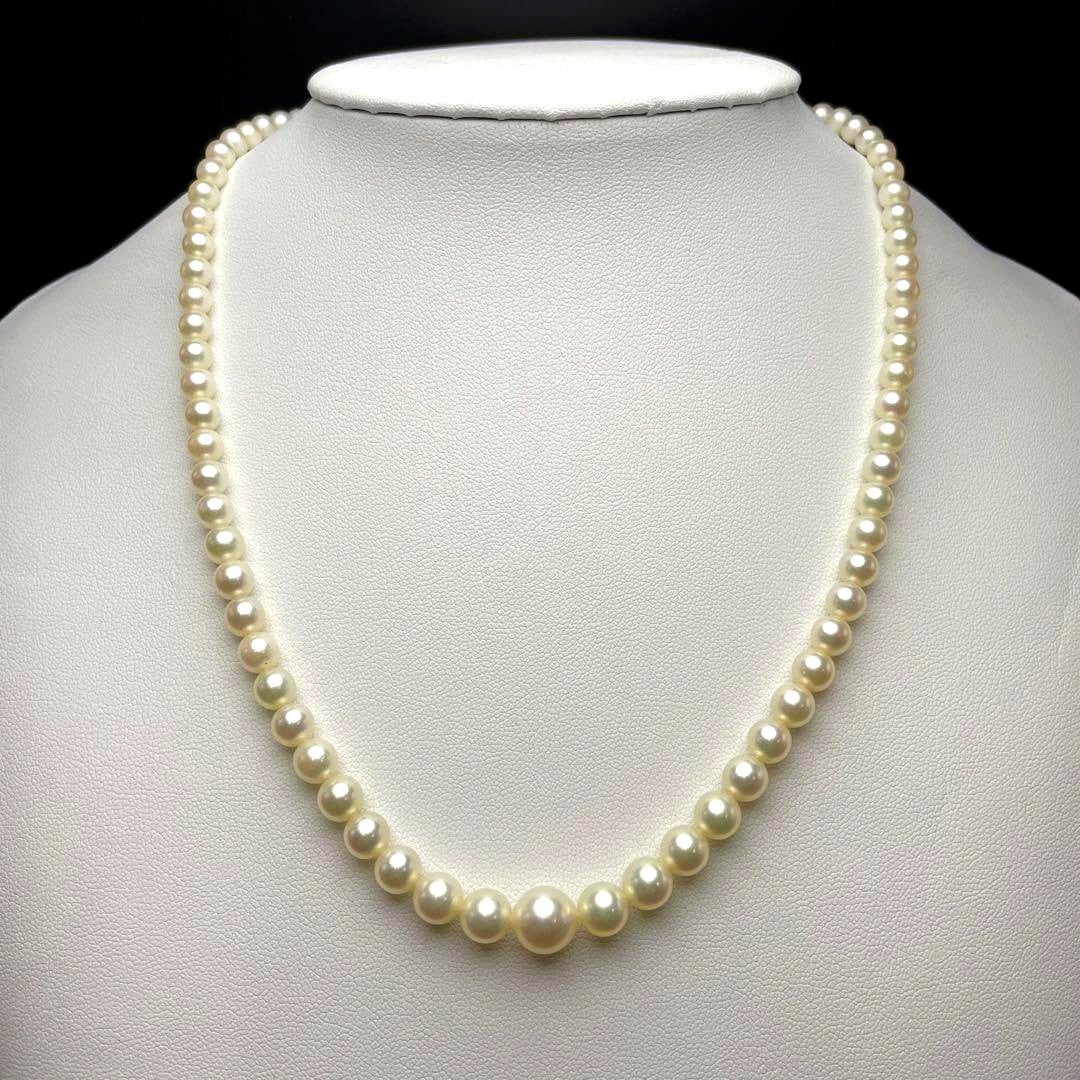 Mikimoto Akoya pearls necklace featuring white 4.5-8.5mm pearls with K14 clasp and pinkish natural interference color