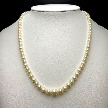 Mikimoto Akoya pearls necklace featuring white 4.5-8.5mm pearls with K14 clasp and pinkish natural interference color