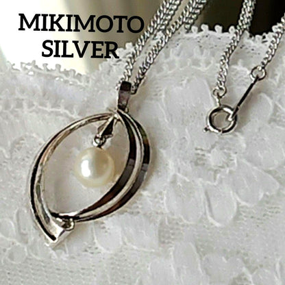 Mikimoto silver open ring with 6.4mm Akoya pearl necklace and 42cm chain displayed on white background