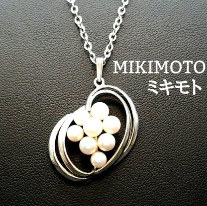 Mikimoto pearl necklace featuring grape motif pendant with 8 pearls on a silver stainless steel chain, 42 cm long