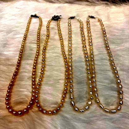 Akoya and Freshwater Pearl Necklace set with silver clasps totaling 83 grams