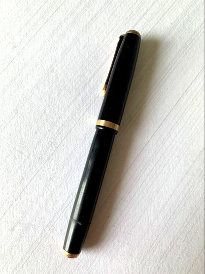 Pilot Fountain Pen featuring a 14K gold nib with a sleek black barrel