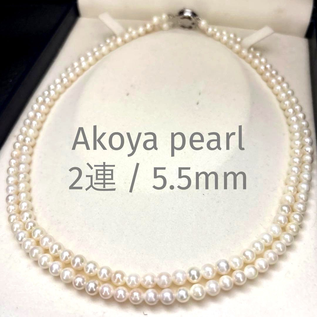 Two-strand necklace with white 5.5mm round Akoya baby pearls featuring silver mark