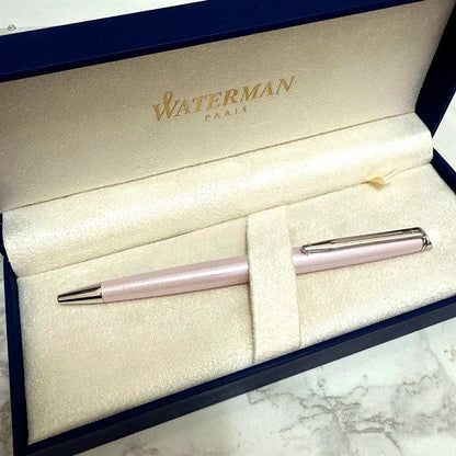 Waterman pink metal ballpoint pen with dedicated case on white background