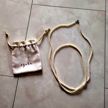 Agete white pearl necklace with lobster clasp, 110 cm long, featuring lustrous white pearls
