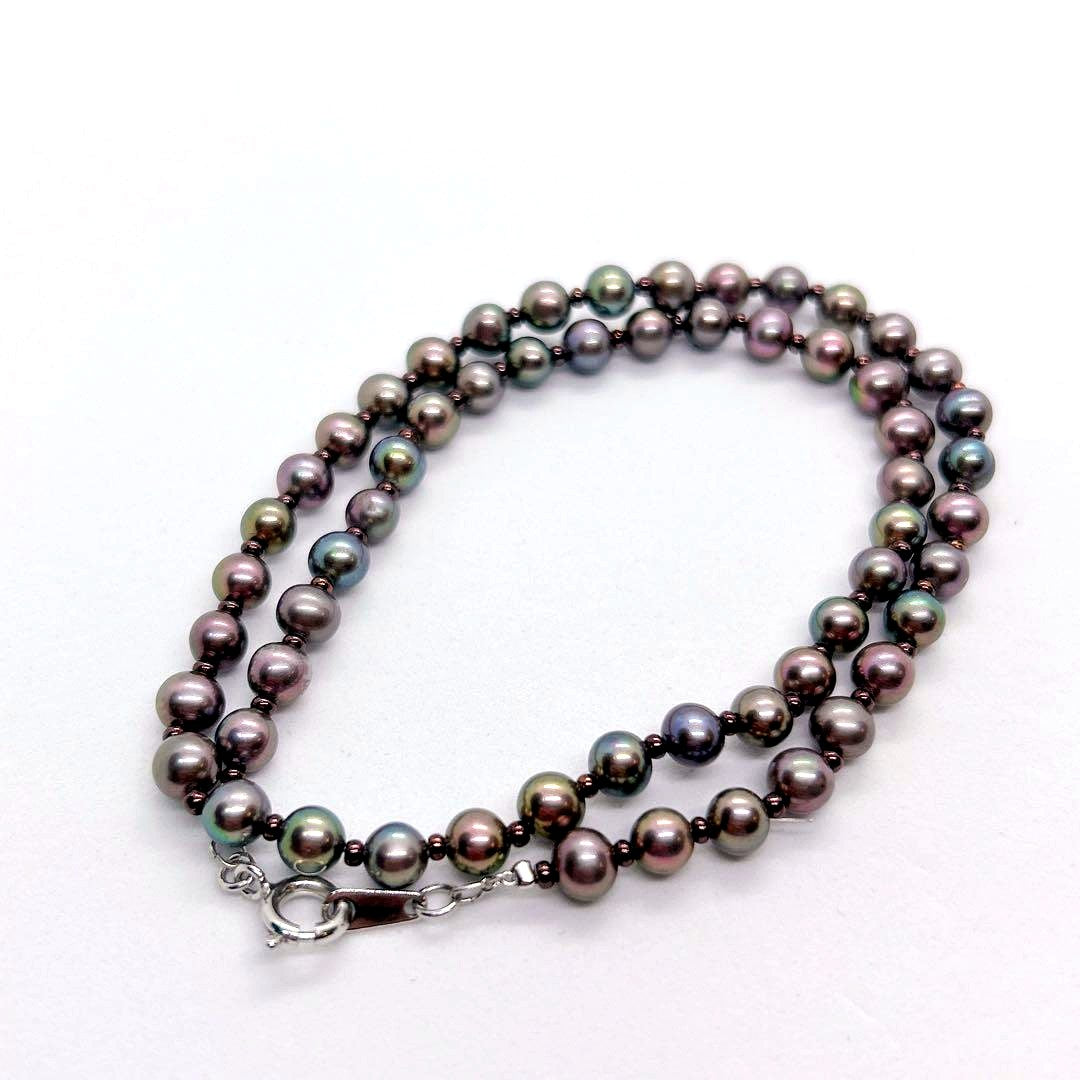 Akoya pearl necklace with baby black aurora pearls measuring 5.3-5.4mm on a 40cm chain