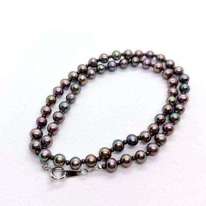 Akoya pearl necklace with baby black aurora pearls measuring 5.3-5.4mm on a 40cm chain