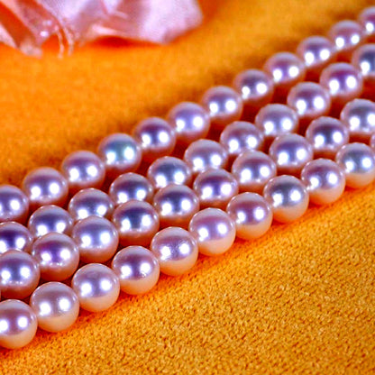 Akoya genuine pearl long necklace featuring two rows of flower pearl inclusions on a white background