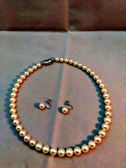Uncolored Aurora Rose Akoya pearl necklace and matching earrings with pearls sized 8 to 8.5 mm