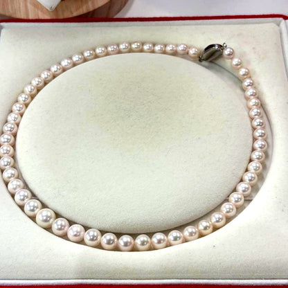 Akoya pearl necklace 44cm with 6.9-9.5mm gradient pearls from Ise-Shima Ago Bay displayed on a white background