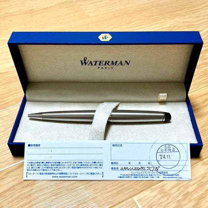 Waterman Expert Essential Metallic CT fountain pen with metallic finish and gold trim, shown uncapped on white background