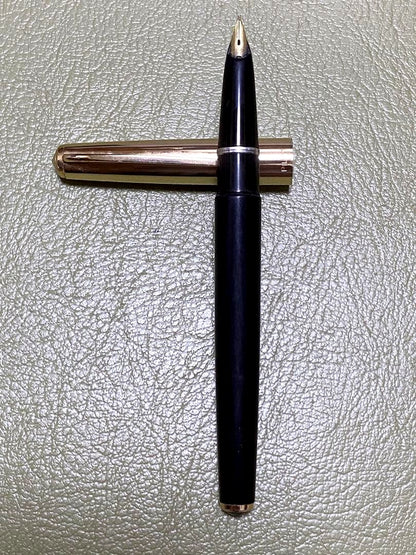 Pilot 14k Fountain Pen in gold finish showcasing nib and cap for premium writing