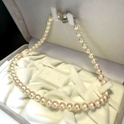 Akoya pearl necklace featuring approximately 7.8mm large white-based pearls
