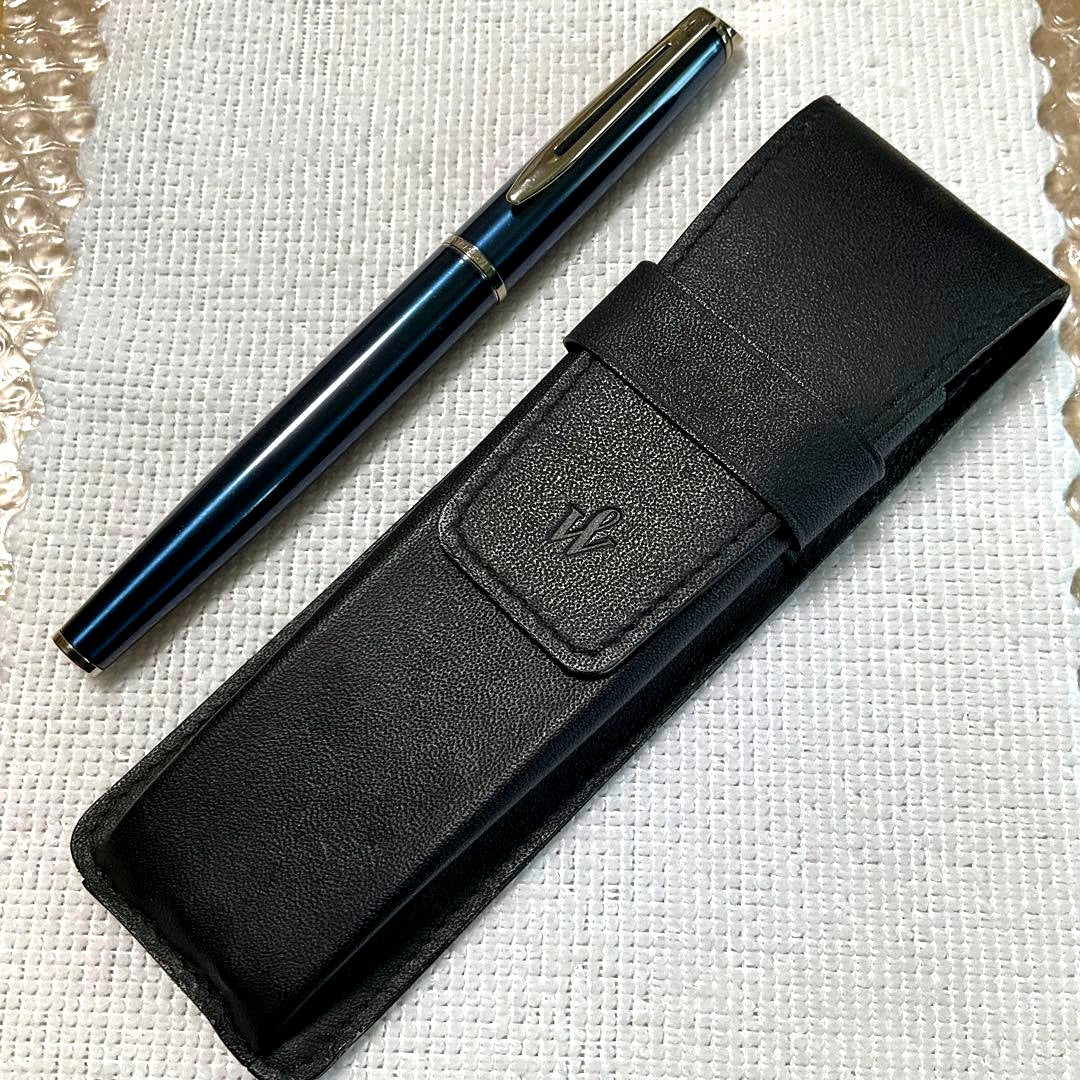 WATERMAN fountain pen with converter and black pen case holding three writing instruments