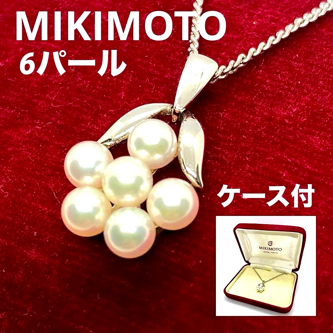 Mikimoto Akoya pearl flower necklace with silver chain and 15x13 mm flower-shaped pendant