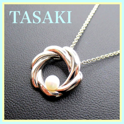 TASAKI Pearl Necklace Circle SUN featuring single pearl on 42 cm silver chain with pendant marked TASAKI