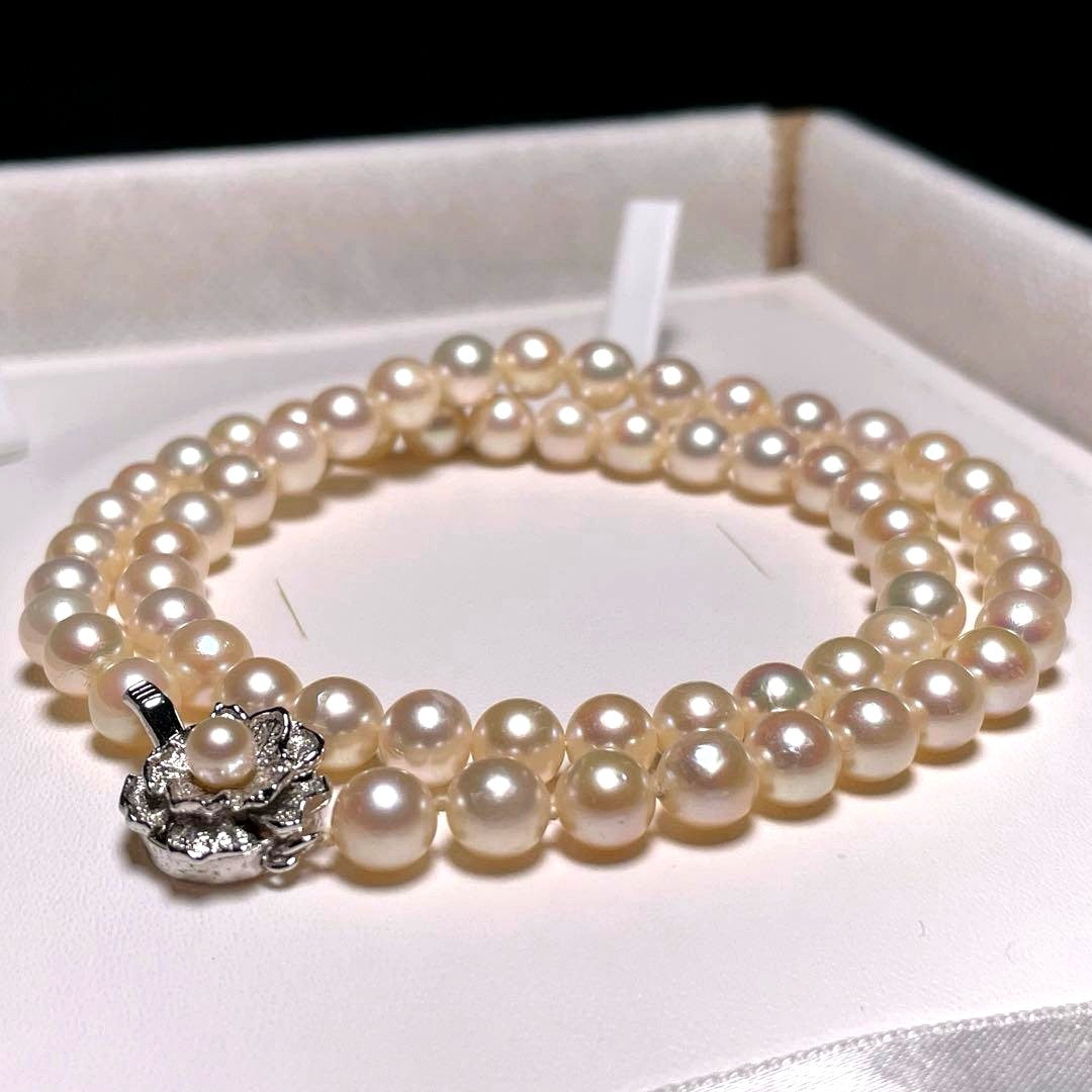 Akoya pearl semi-round pearl necklace with 6.4-7.0mm white pearls on silver chain, 42.8 cm length