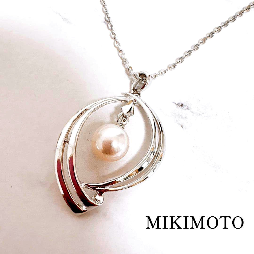 Mikimoto silver necklace featuring a 6mm Akoya pearl pendant measuring 3.1 cm by 1.8 cm on a 40.2 cm chain