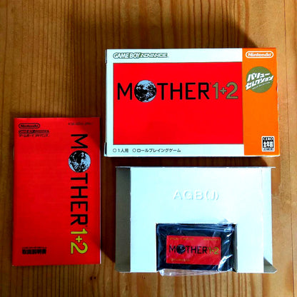 Game Boy Advance MOTHER1+2 game cartridge showing front label with visible signs of aging