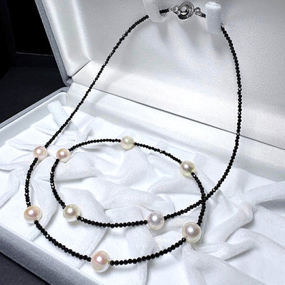 Akoya pearl and black spinel necklace with nine 8.1mm pearl beads on a 59cm chain