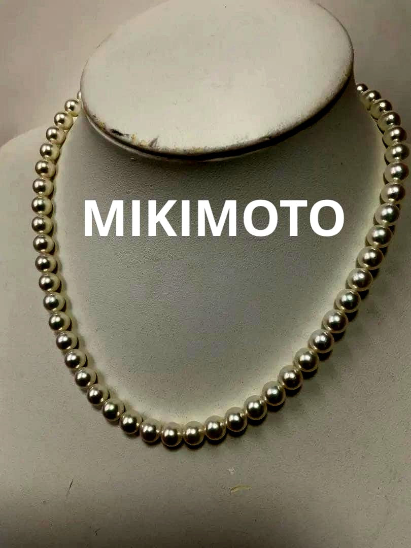 Mikimoto pearl necklace with 57 round pearls sized 7 to 7.5 mm on a 43 cm strand