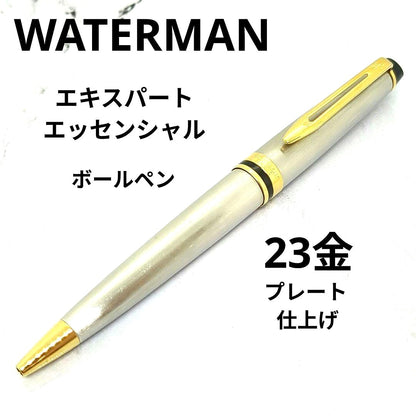Waterman Expert ballpoint pen with steel satin finish and 23K gold trim, showing minor wear