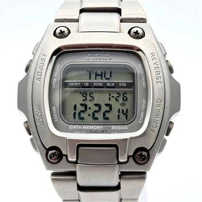 Casio MRG-210T vintage digital watch with 42mm stainless steel case showing signs of use