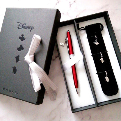 Red Cross Disney Limited Sentiment rotating ballpoint pen with 4 charms and black carrying case