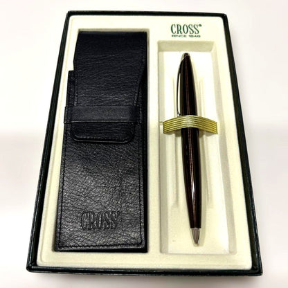 Cross brand ballpoint pen with genuine leather case shown on a white background