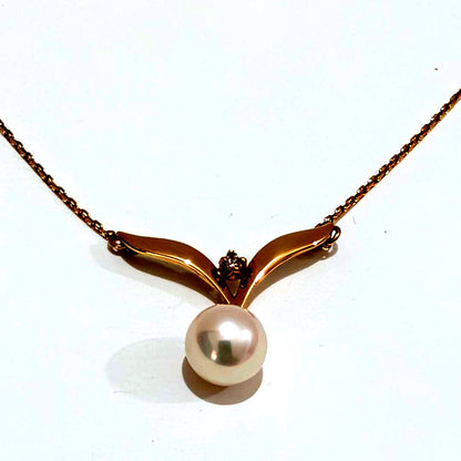 Mikimoto pearl diamond necklace with 7.2mm pearl pendant set in 18K yellow gold on 40 cm chain