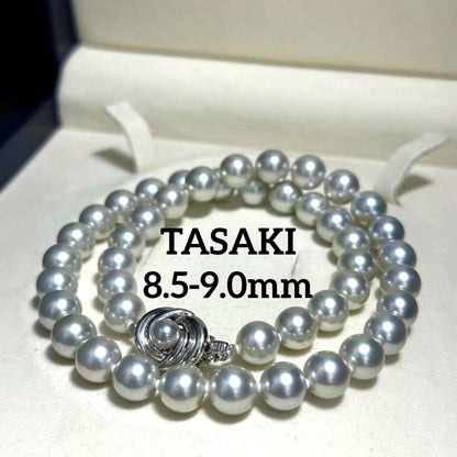 Tasaki Akoya pearl necklace with 8.5-9.0mm pearls and silver clasp on a white background