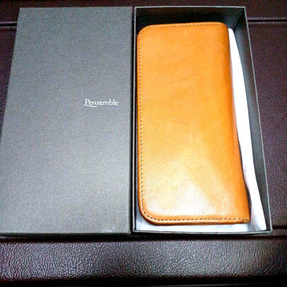 Brown leather Pentsamble Round Zip pen case with zip closure and long wallet design