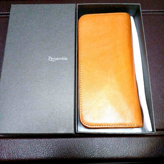 Brown leather Pentsamble Round Zip pen case with zip closure and long wallet design