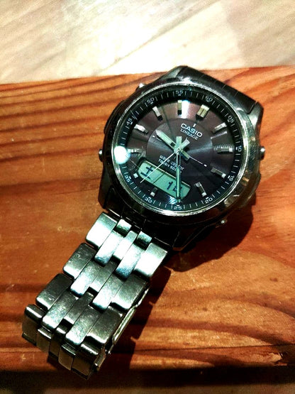 Casio Lineage LCW-100T titanium radio wave solar vintage watch with metal band and analog display