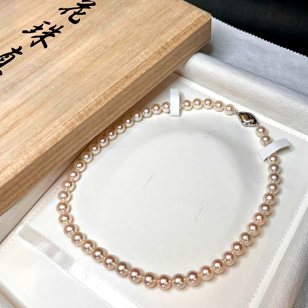 Akoya pearl necklace with white pearls sized 8.0 to 8.5mm on a 41cm strand with silver clasp