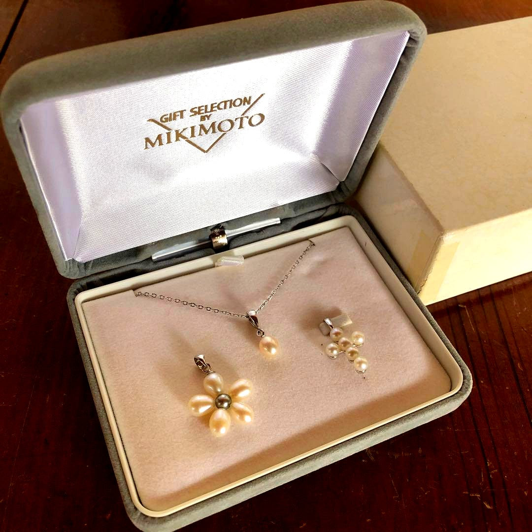 Mikimoto necklace with silver cross pendant and pearl on a 40cm chain