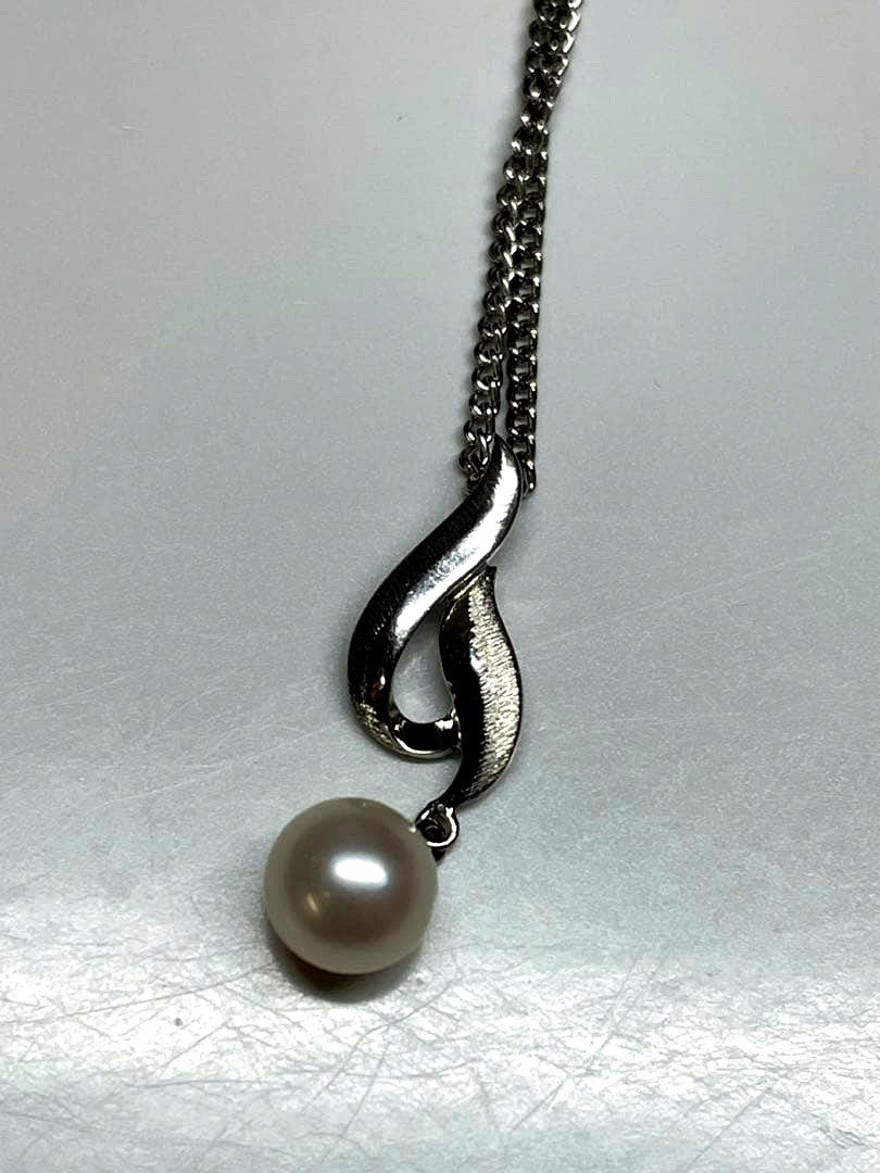 Mikimoto Pearl Pendant Necklace featuring a 7mm silver pearl on a delicate silver chain