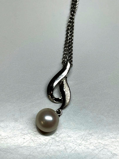 Mikimoto Pearl Pendant Necklace featuring a 7mm silver pearl on a delicate silver chain