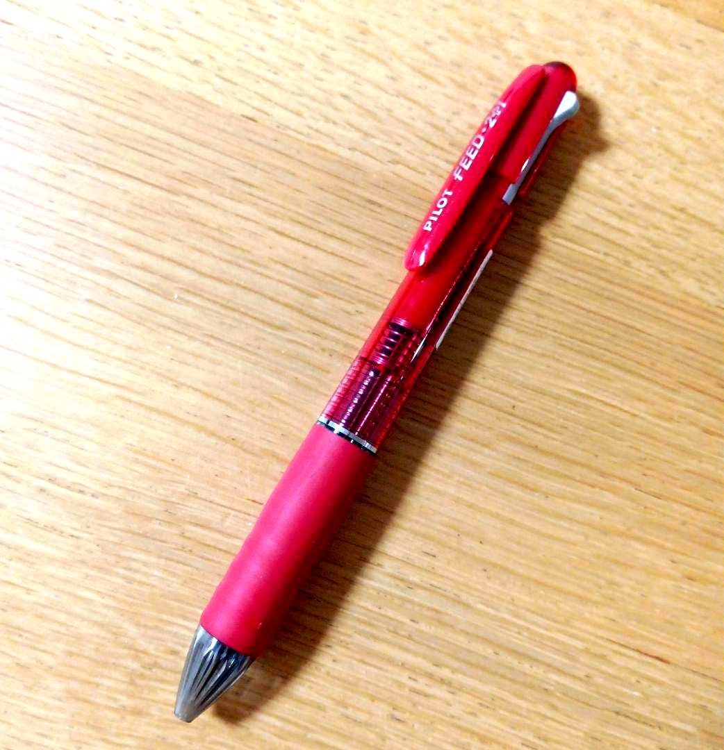 Pilot Feed 2+1 multi-function pen with red barrel and black and red 0.5mm ballpoint tips