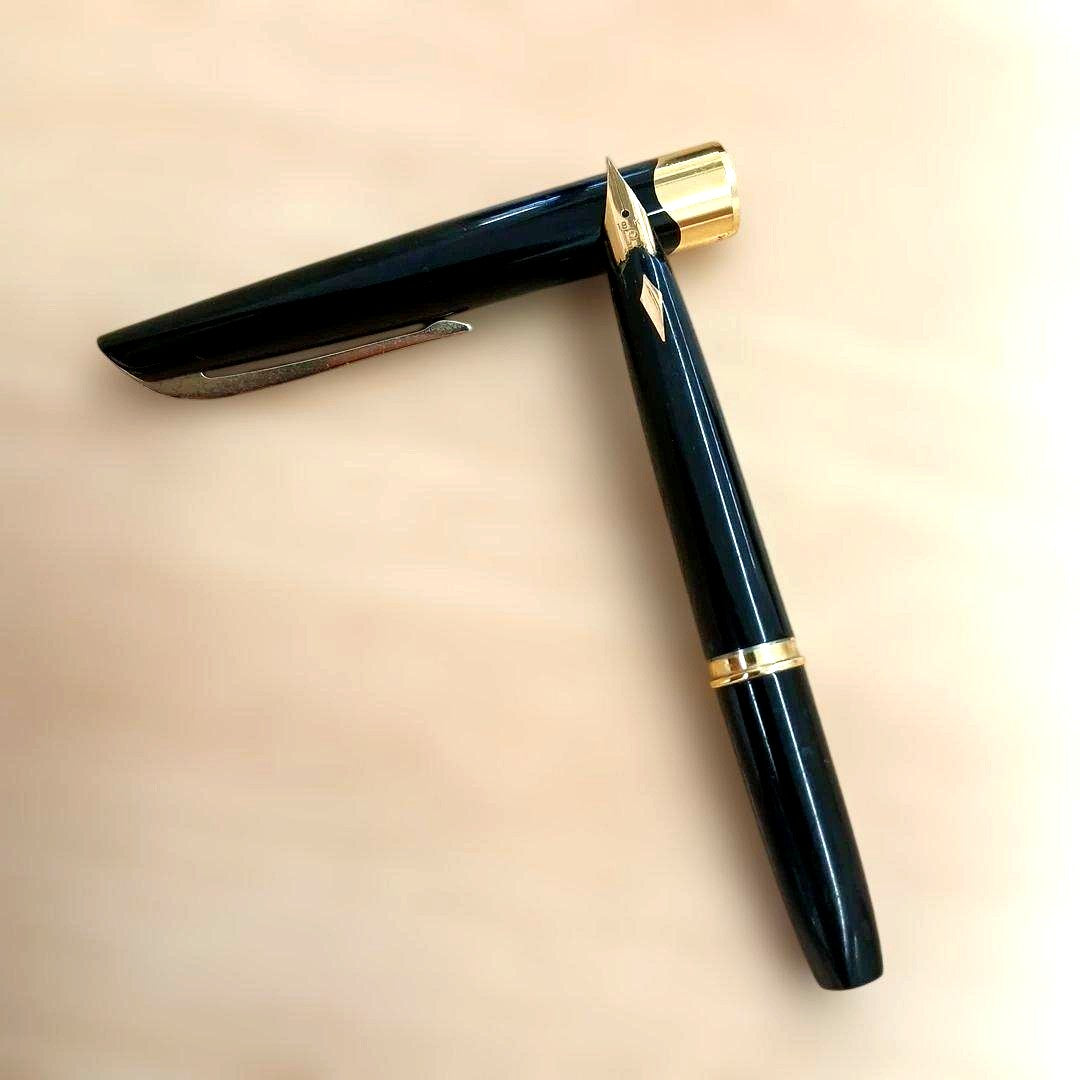 Pilot fountain pen with 18K fine soft engraved tip, vintage used condition, showing previous owner's name