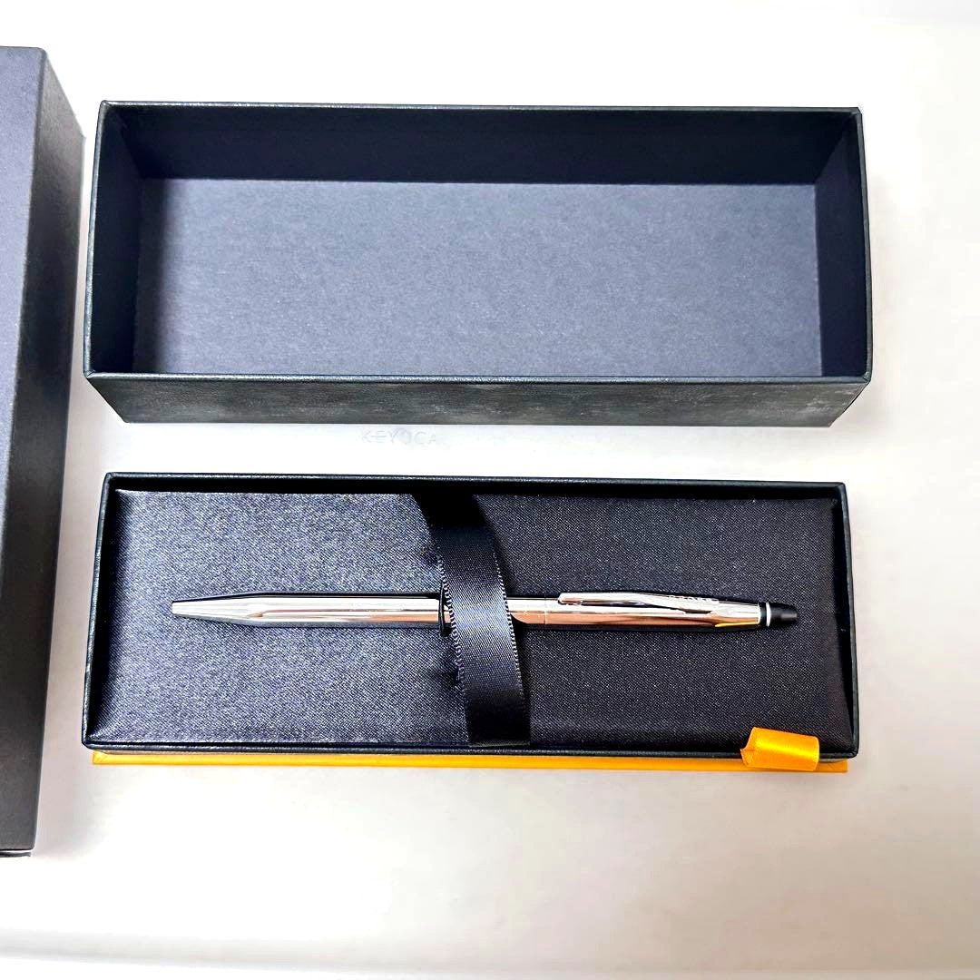 Cross Chrome silver ballpoint pen with case and outer cover showing slight discoloration