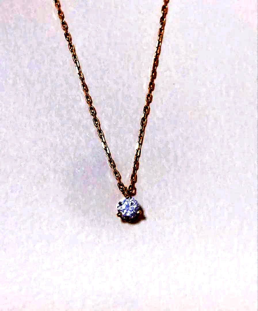 Agate K18 gold necklace featuring a single 0.05 ct diamond on a delicate chain