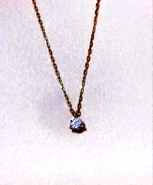 Agate K18 gold necklace featuring a single 0.05 ct diamond on a delicate chain