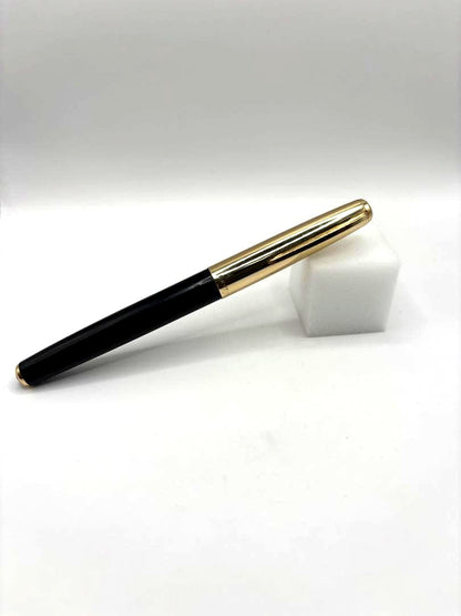 PILOT 14K fountain pen with black body and gold cap featuring an inset nib and 14k engraving