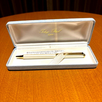 Tokyo Pearl A.T. Cross 8514 gold ballpoint pen featuring a pearl accent on top and included case