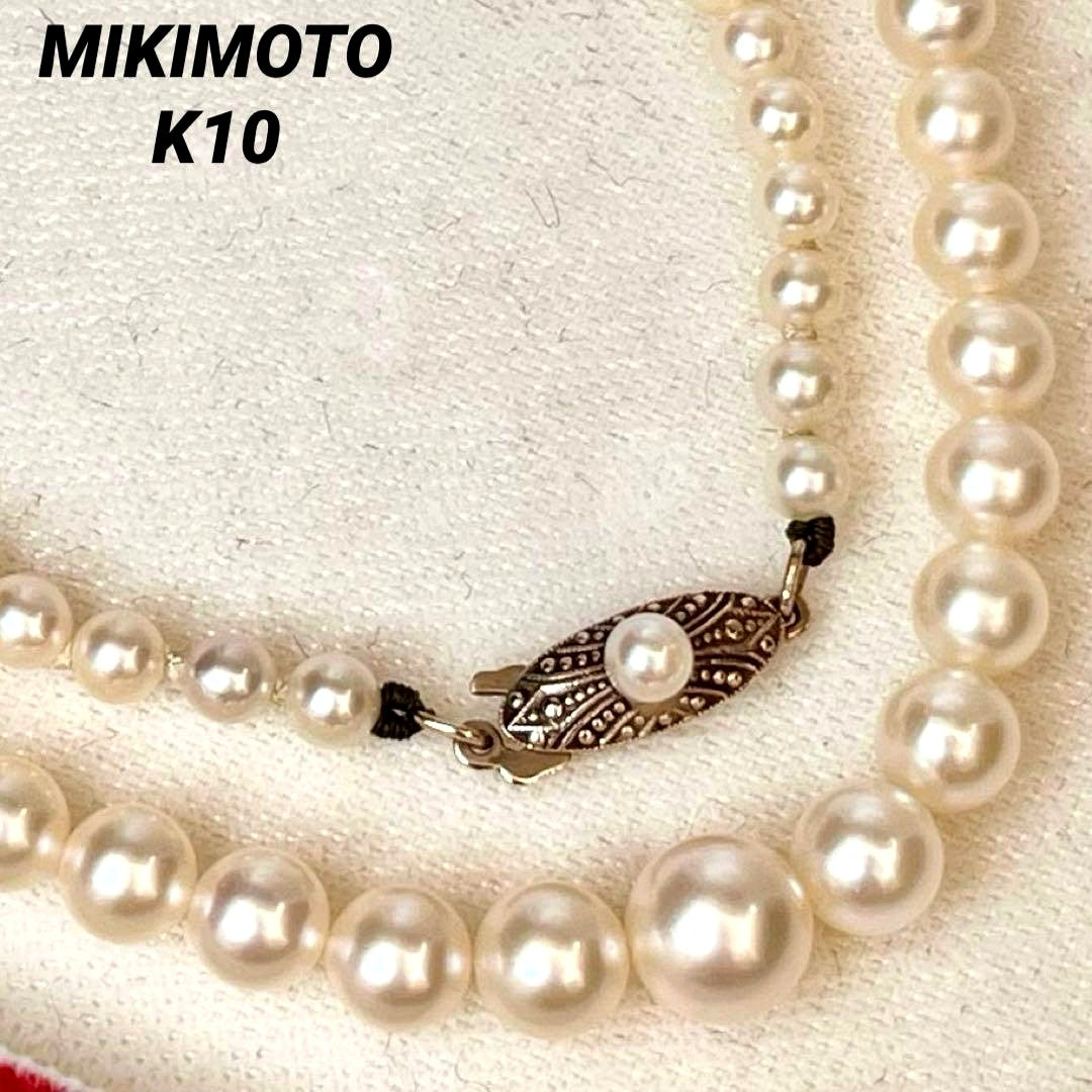 MIKIMOTO Gradient Necklace with cultured pearls ranging 3.6 to 7.0 mm and K10 metal clasp on a white background