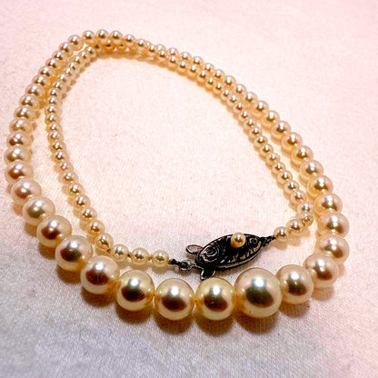 Akoya baby pearl necklace with 3.0 to 7.8mm gradient pearls on a 45.5cm sterling silver chain