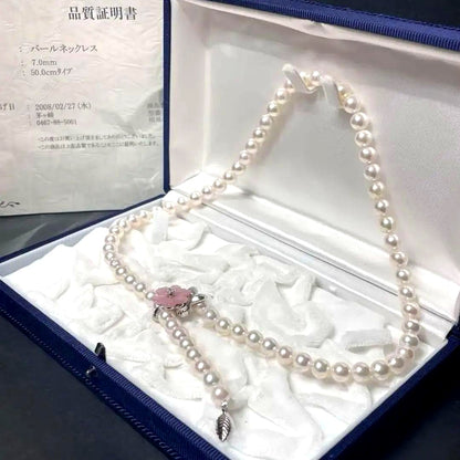 Akoya pearl necklace featuring 7.0-7.4mm pearls and 50cm length displayed on white background