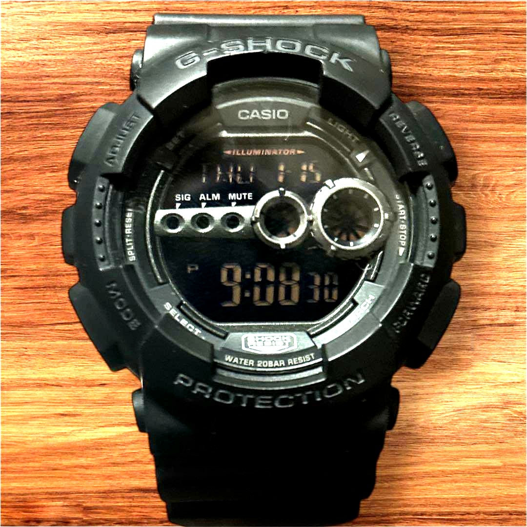 Casio G-Shock GD100 digital watch with black rubber strap and digital display