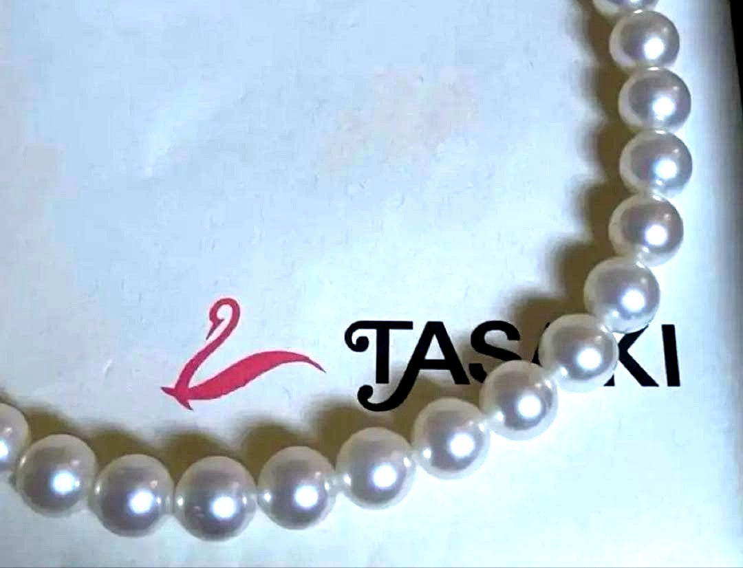 Tasaki pearl necklace featuring 7mm Akoya pearls with 42.5cm princess length and silver clasp